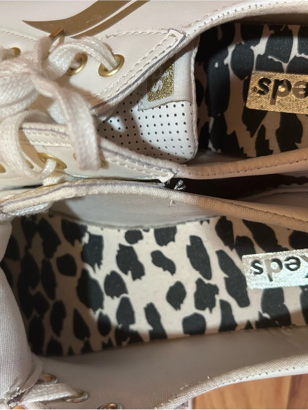 Keds White Sneakers with Gold Accents and Leopard Insole